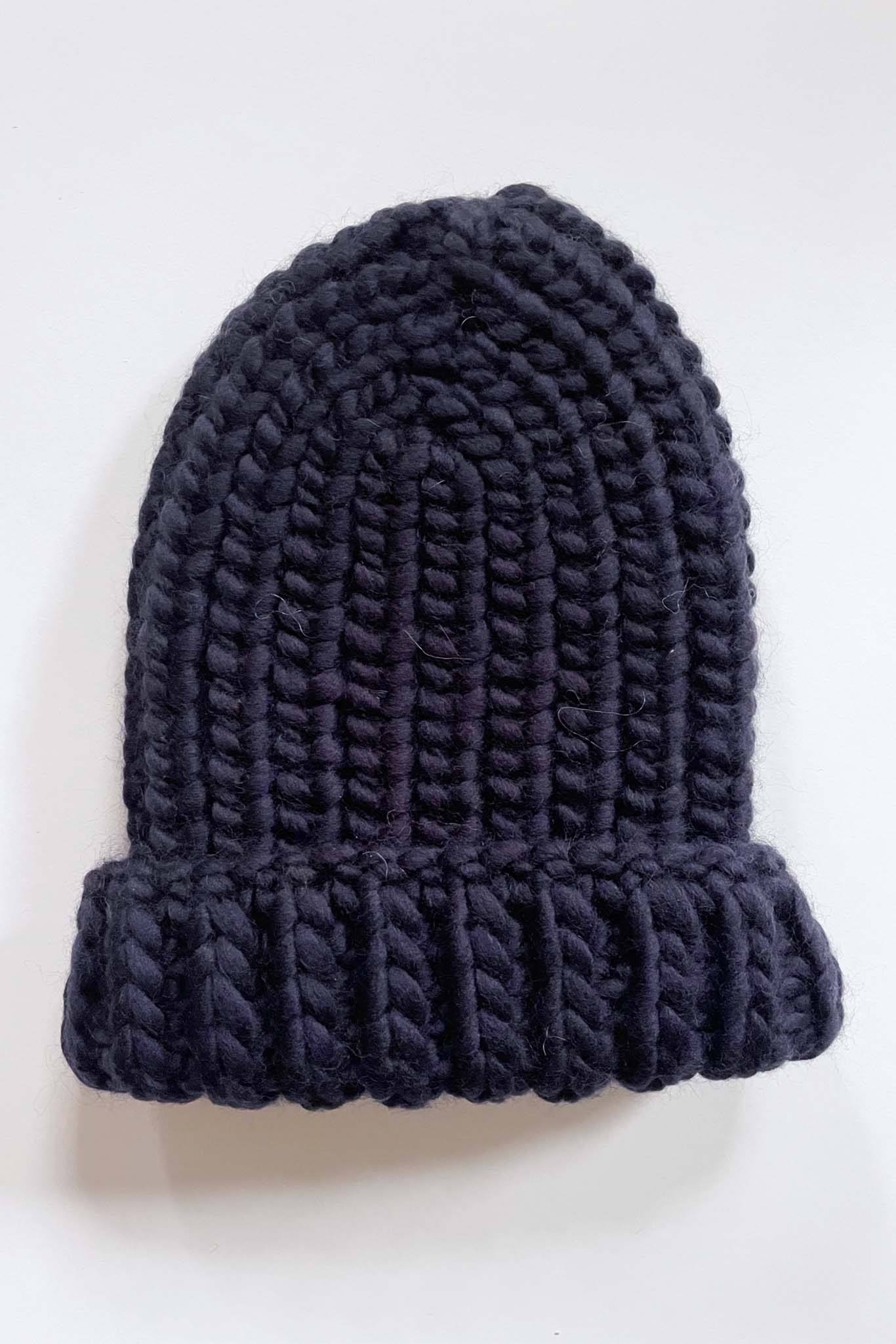 Hand knit wool hat perfect for fall and winter. Made in Perul