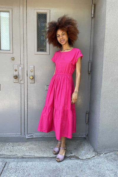 perfect summer sun dress for summer. Occasion dress. Jewel neck line with elastic waist and flowy skirt.