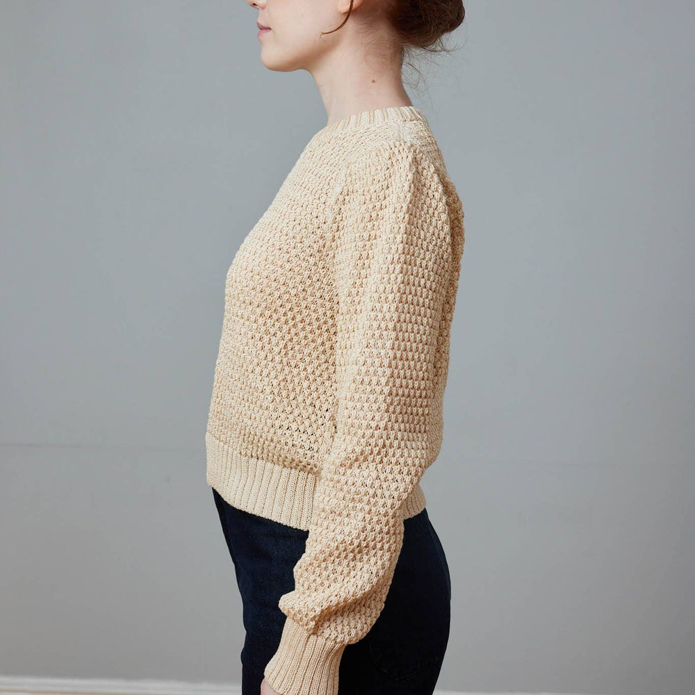 Textural cotton knit crewneck sweater. Made in peru.