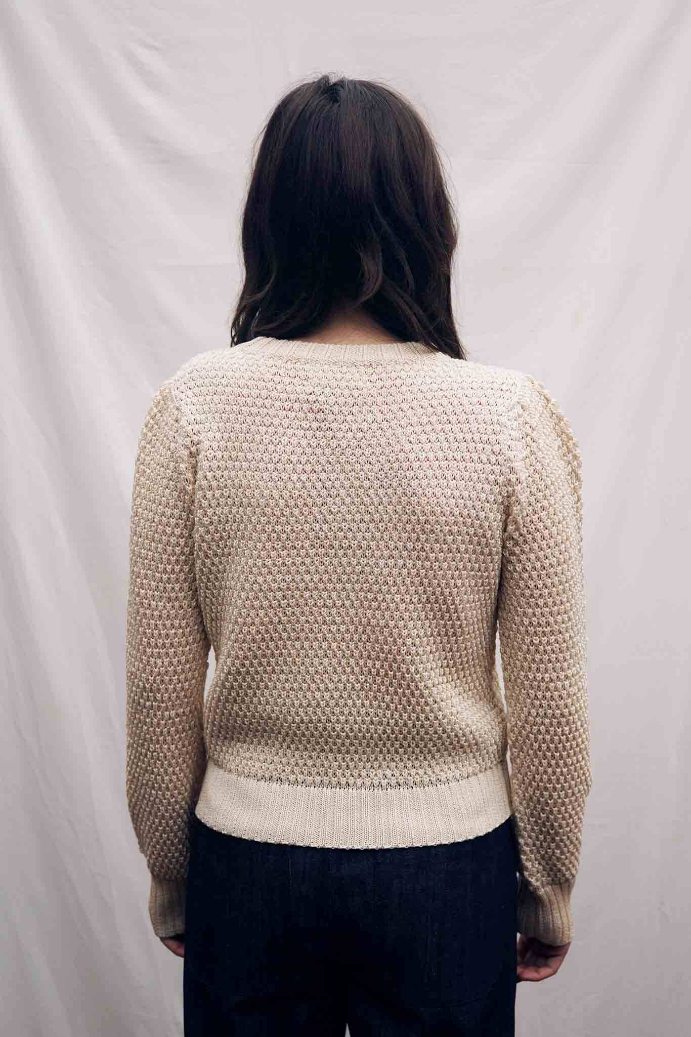 Textural cotton knit crewneck sweater. Made in peru.