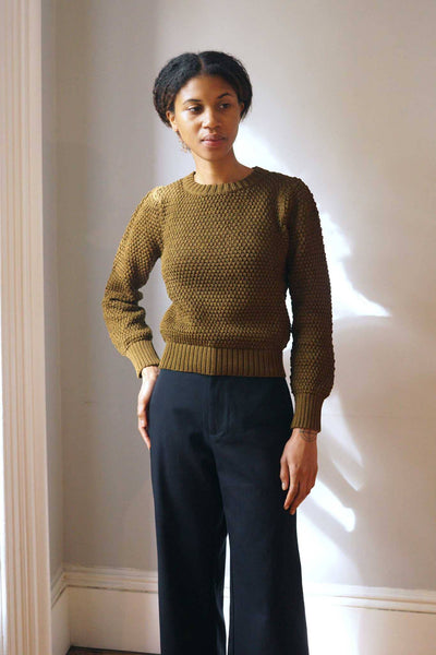 Textural cotton knit crewneck sweater. Made in peru.