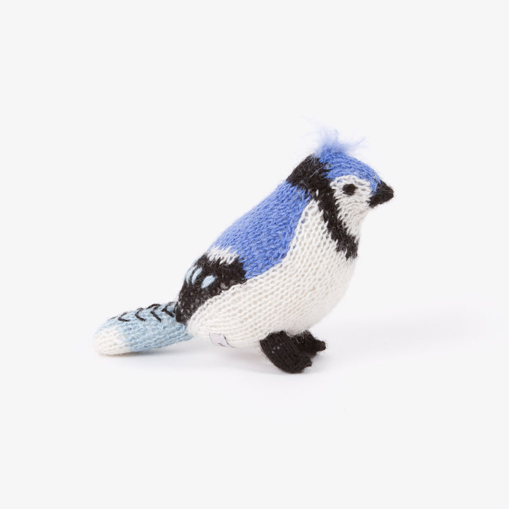 A blue felted blue jay bird toy